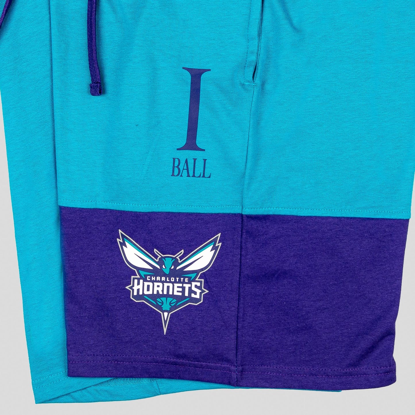 Detské basketbalové šortky OUTER STUFF NBA PURE SHOOTER SHORT CHARLOTTE HORNETS BALL LAMELO (od 8 do 20 rokov) modro/fialové