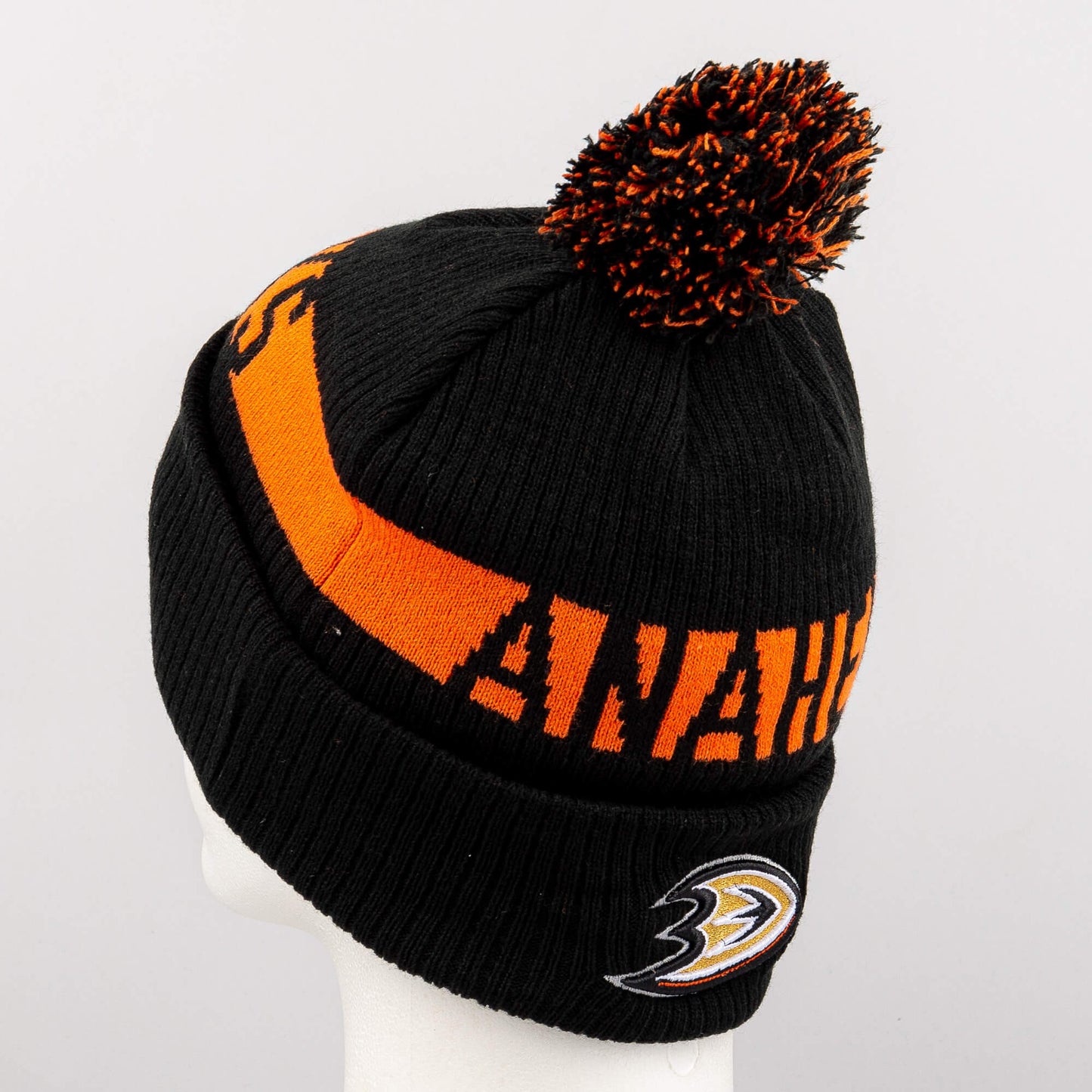 Zimná čiapka s brmbolcom Fanatics NHL Fundamental Beanie Cuff with Pom Anaheim Ducks čierna/oranžová
