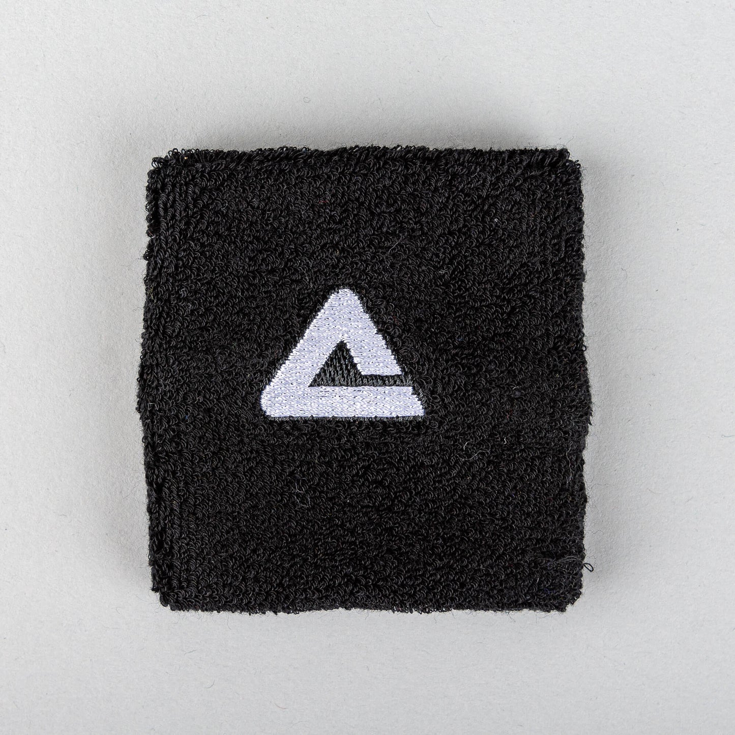 Potítko Peak Wristband (8x8 cm) čierne