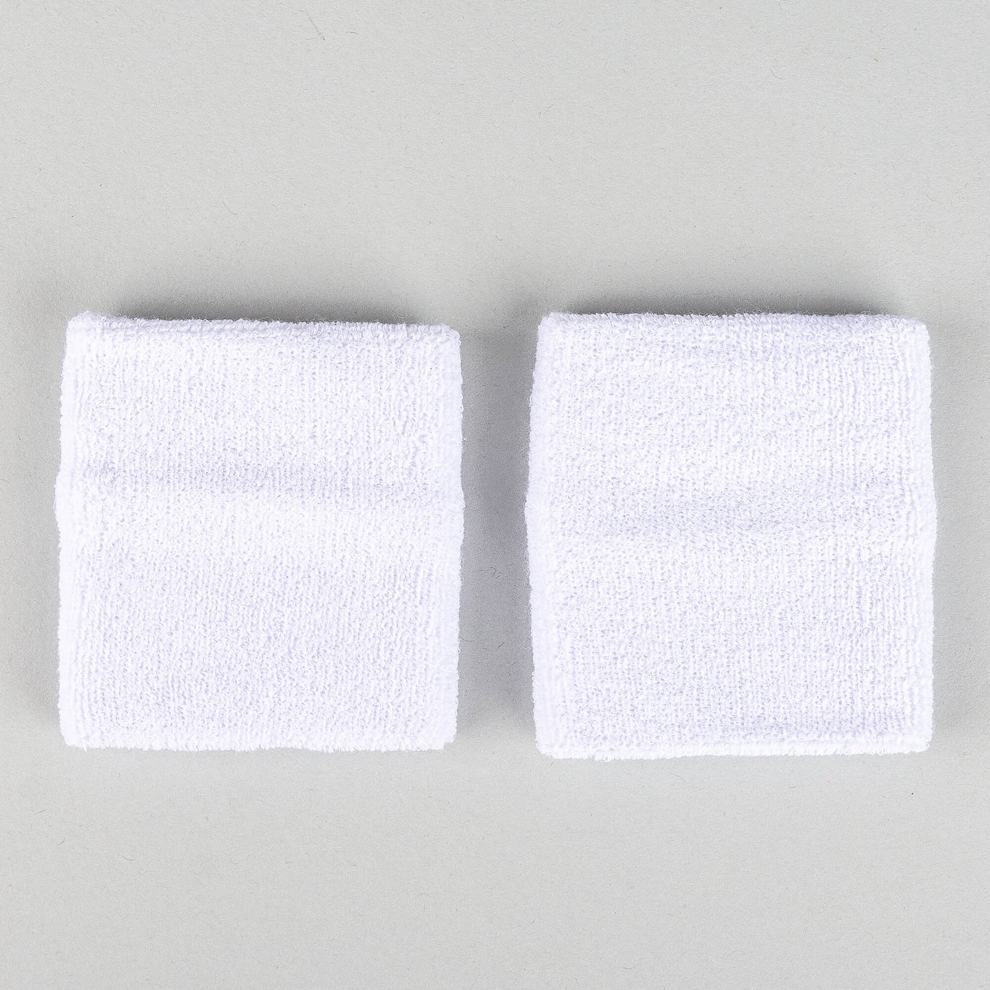 Potítko Peak Wristband (8x8 cm) biele