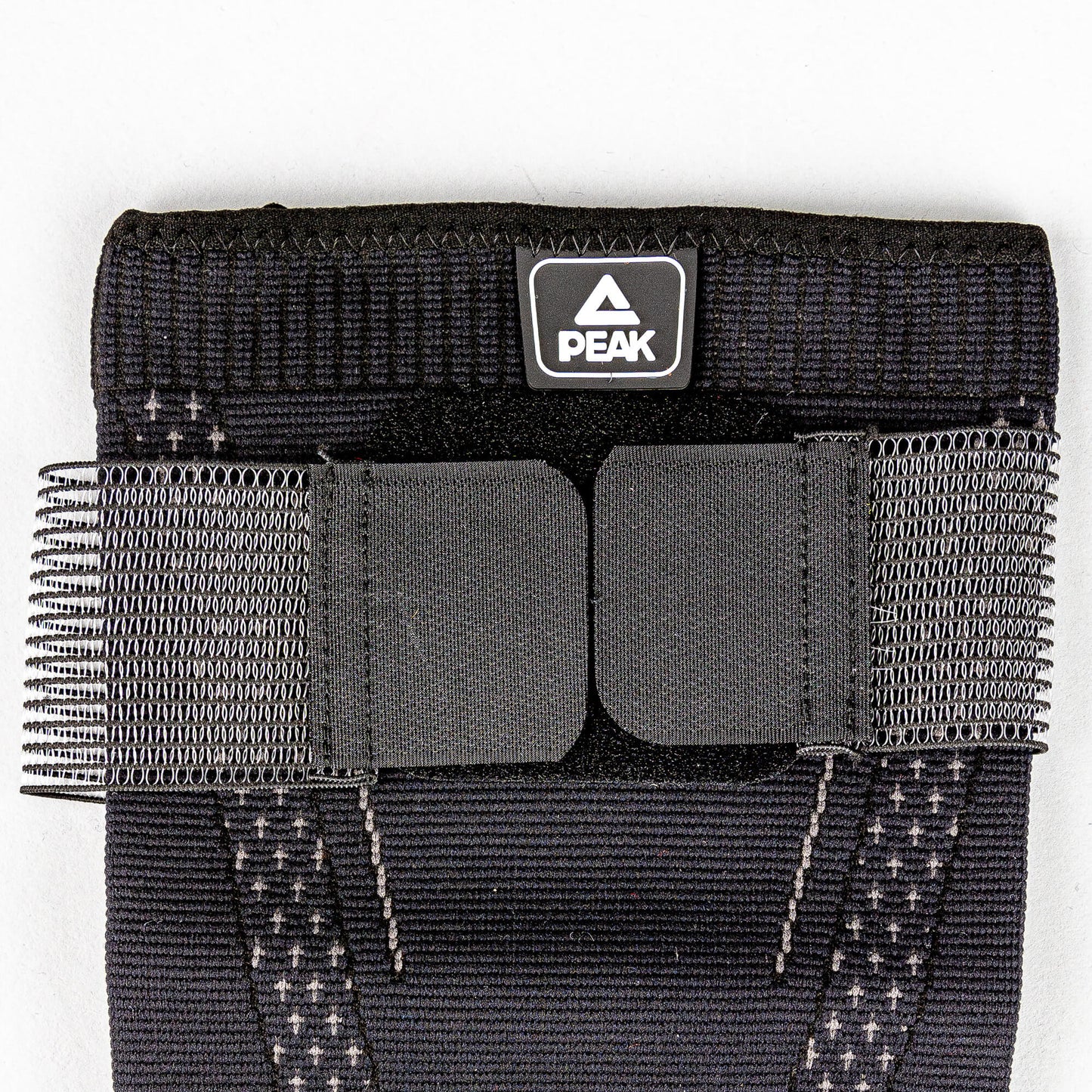 Elastický chránič kolena Peak Knee Protector čierny