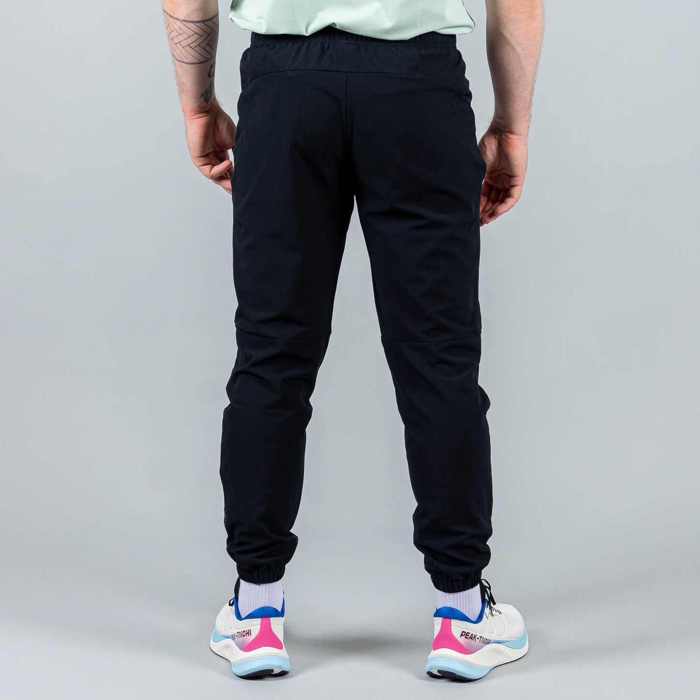 Bežecké Nohavice Peak (Woven Fleece Pants) Black
