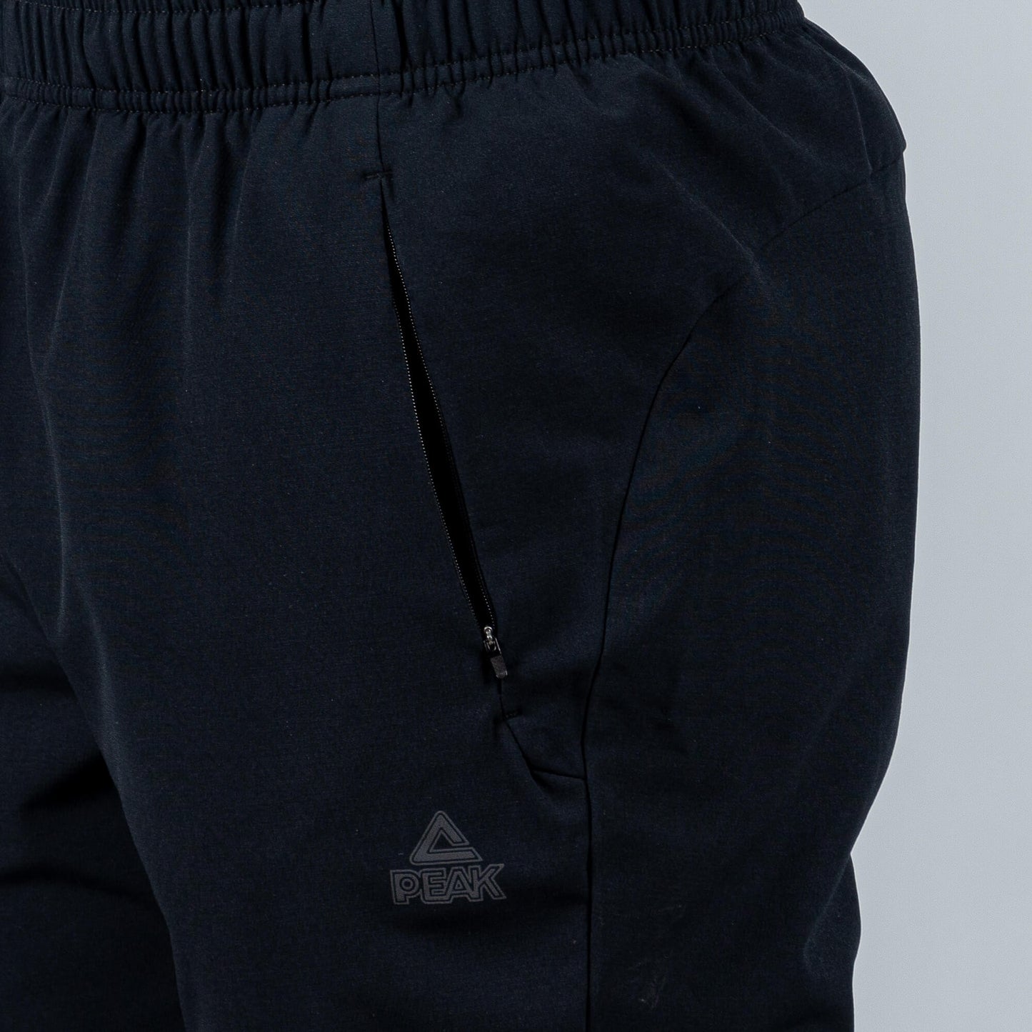 Bežecké Nohavice Peak (Woven Fleece Pants) Black
