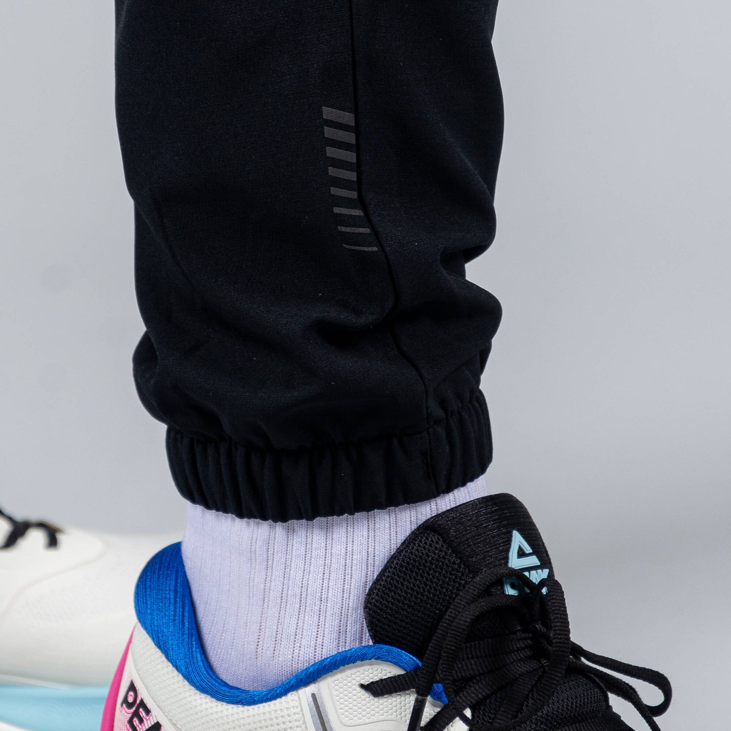 Bežecké Nohavice Peak (Woven Fleece Pants) Black