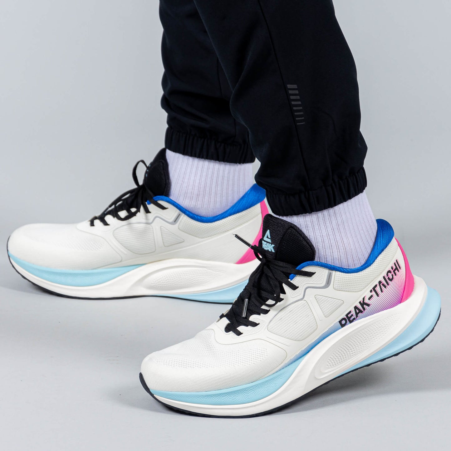 Bežecké Nohavice Peak (Woven Fleece Pants) Black