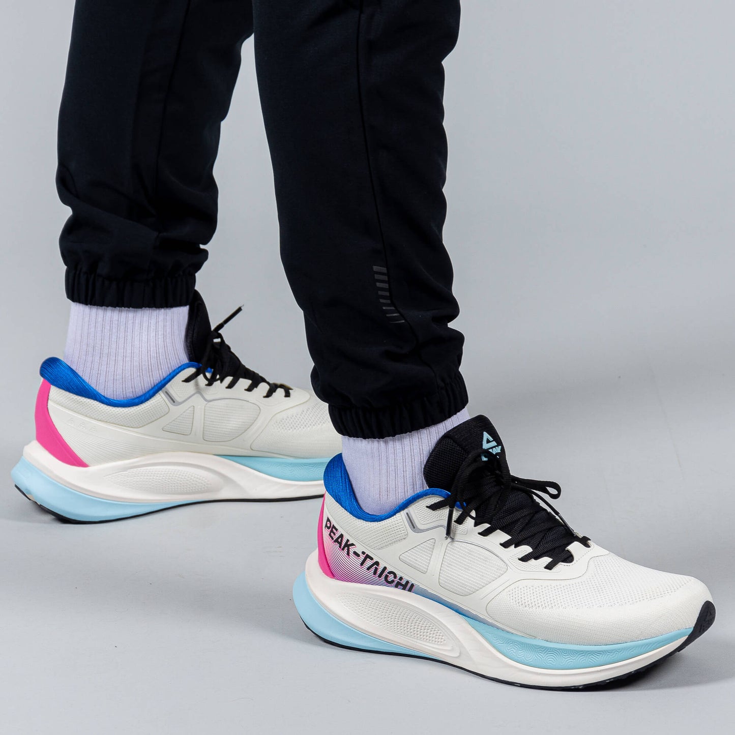 Bežecké Nohavice Peak (Woven Fleece Pants) Black