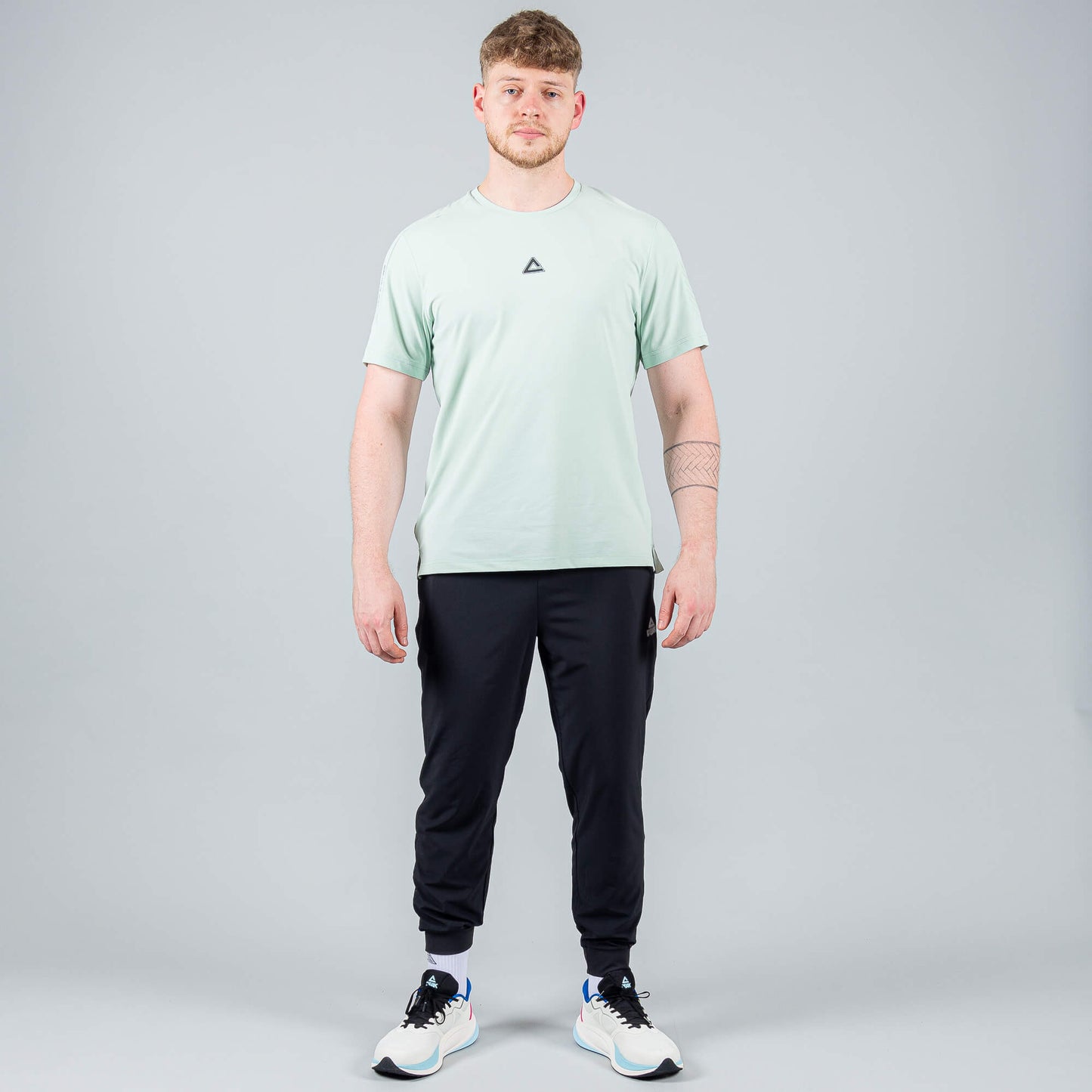 Bežecké tepláky PEAK P-DRY čierne BLACK