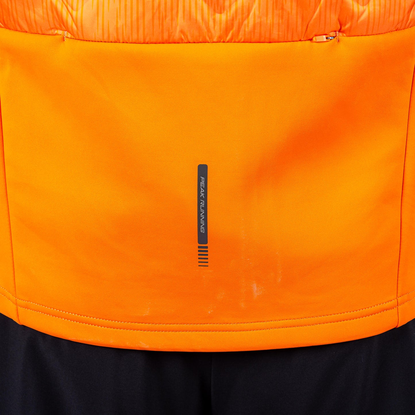 Bežecká Páperová Vesta Peak Down Waistcoat Orange