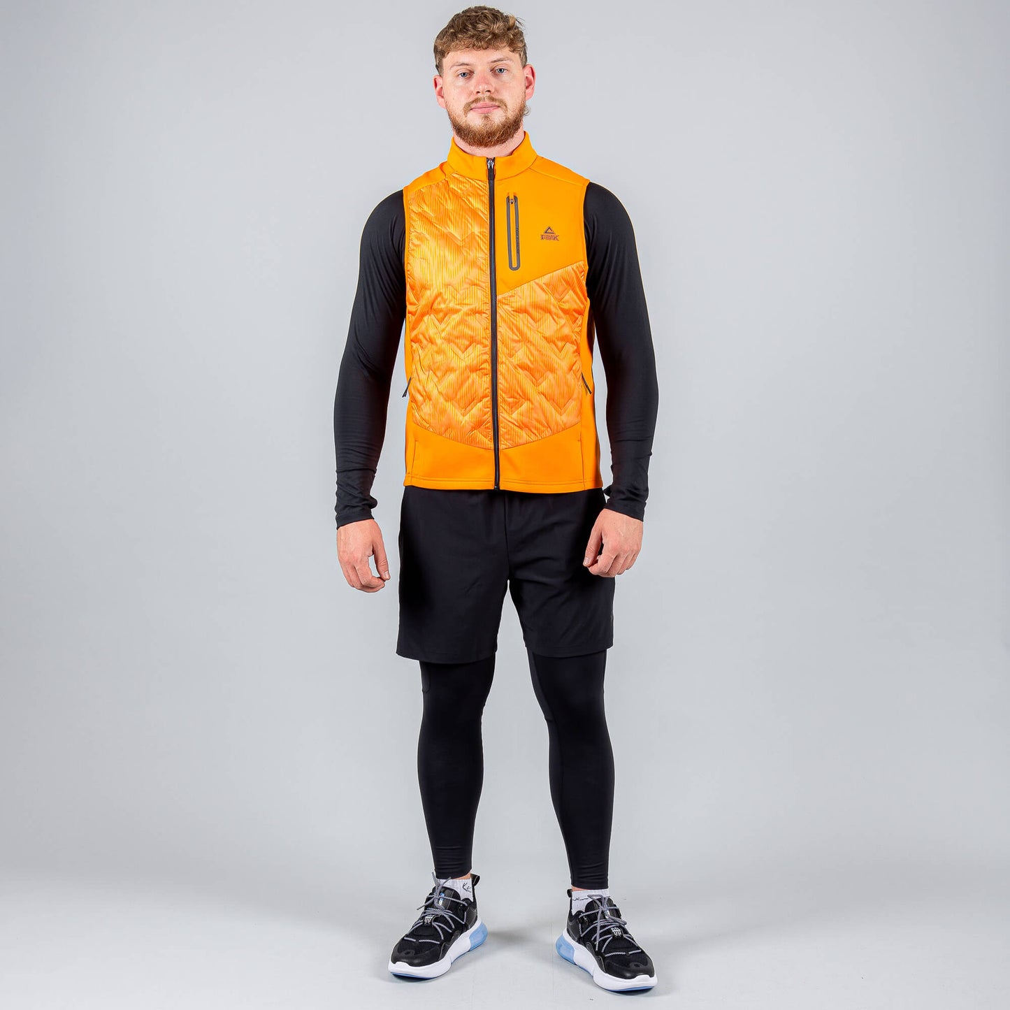 Bežecká Páperová Vesta Peak Down Waistcoat Orange