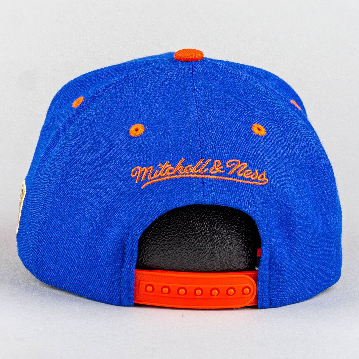 Šiltovka Mitchell & Ness New York Knicks Team Arch Snapback modrá/oranžová