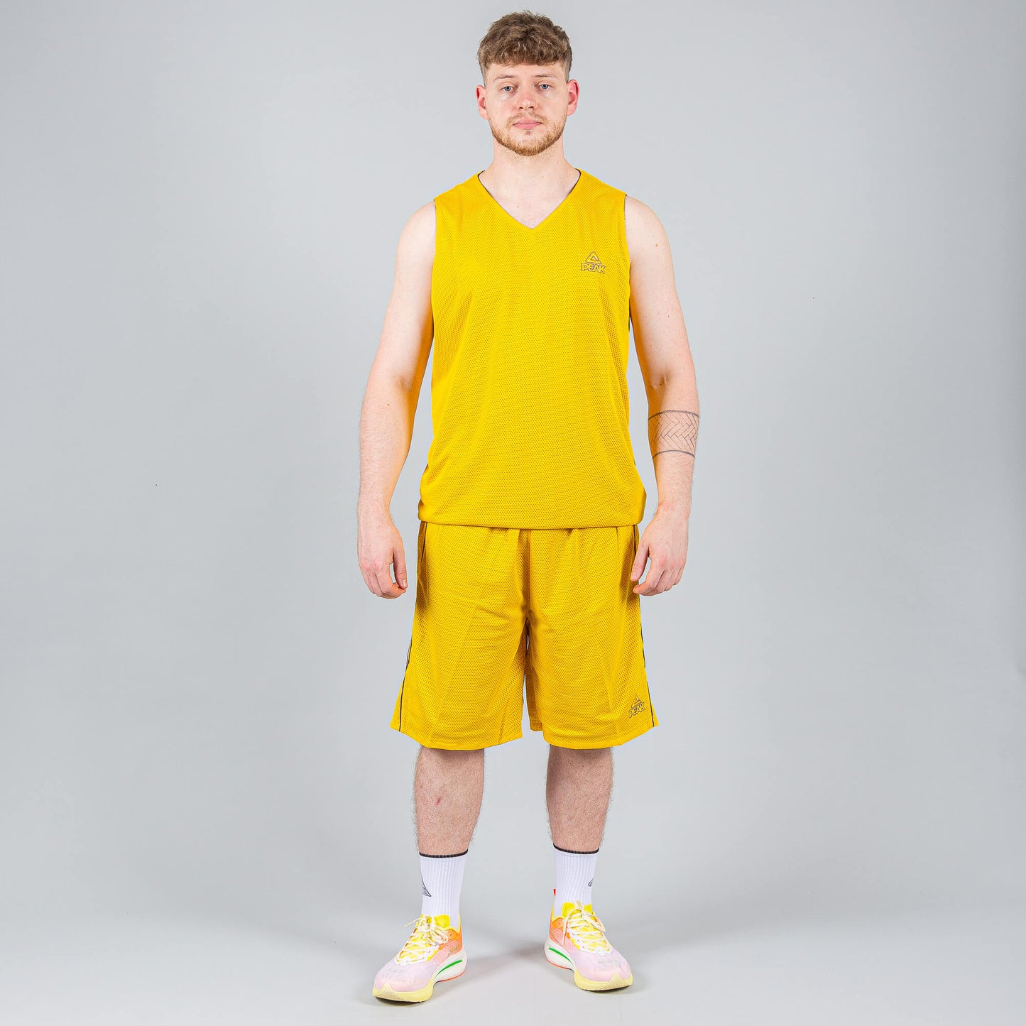 Obojstranná basketbalová súprava (dres + trenírky) PEAK Basketball MATCH REVERSIBLE SET Žlto-fialová