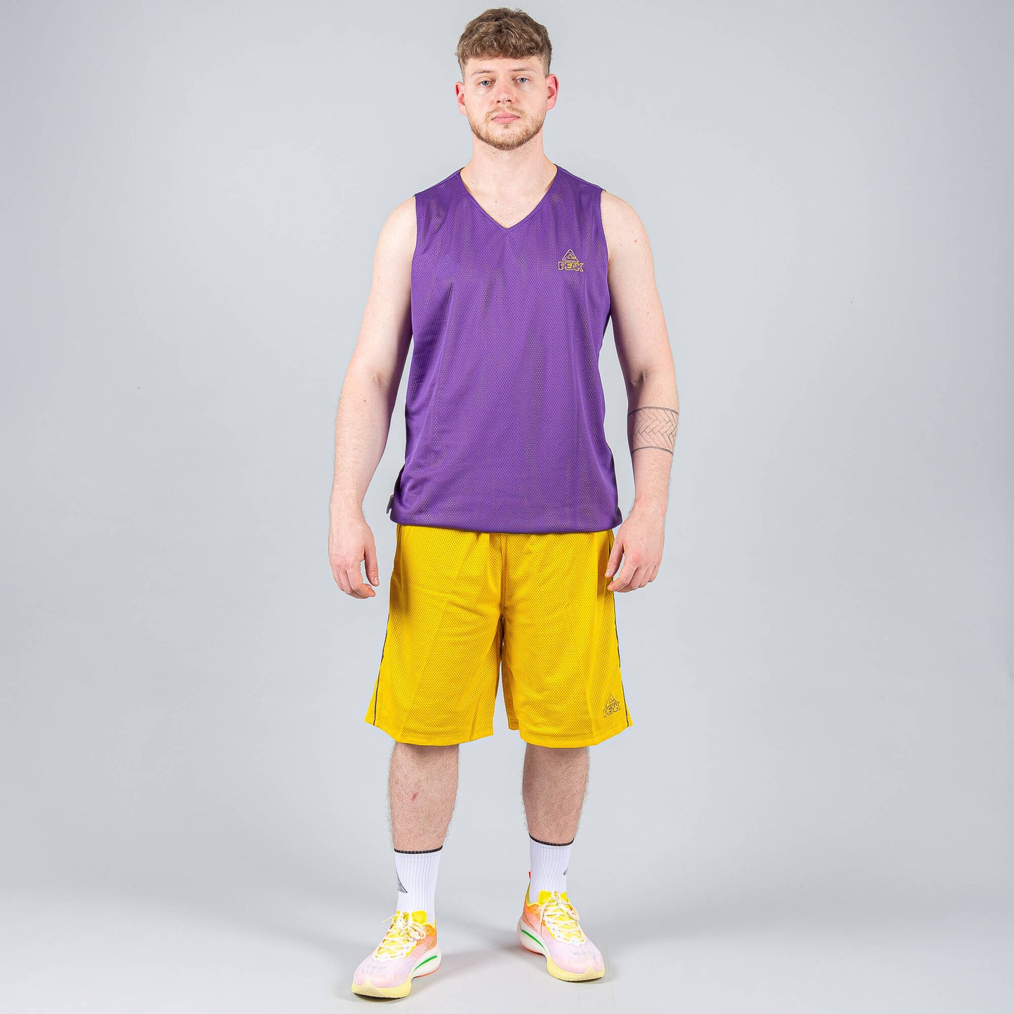 Obojstranná basketbalová súprava (dres + trenírky) PEAK Basketball MATCH REVERSIBLE SET Žlto-fialová