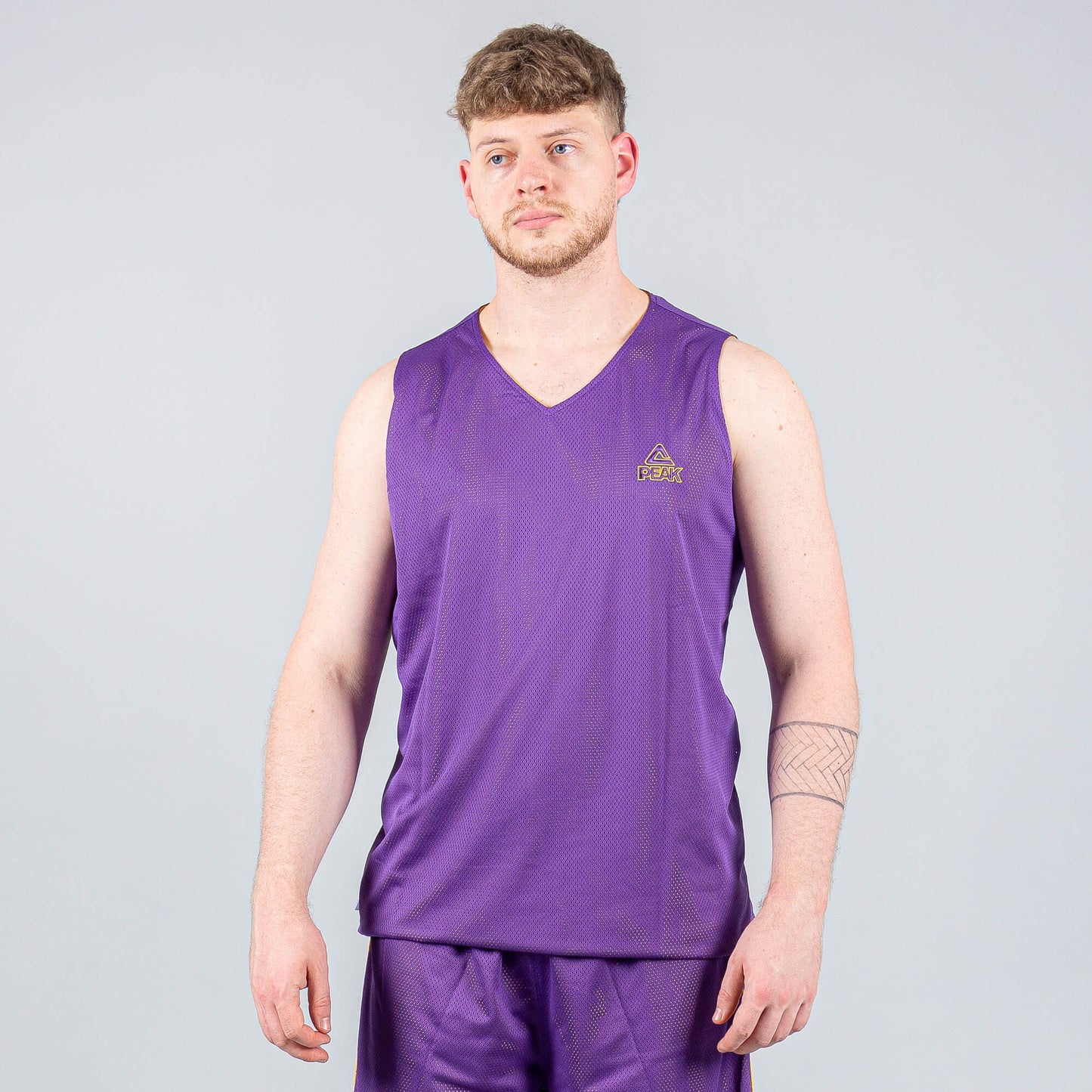 Obojstranná basketbalová súprava (dres + trenírky) PEAK Basketball MATCH REVERSIBLE SET Žlto-fialová