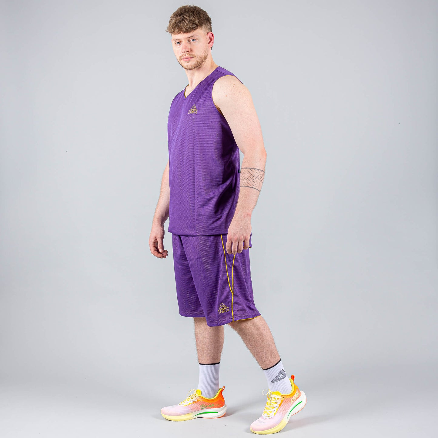 Obojstranná basketbalová súprava (dres + trenírky) PEAK Basketball MATCH REVERSIBLE SET Žlto-fialová