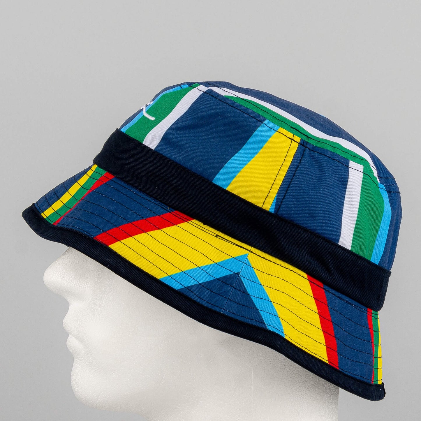 Karl Kani KK Signature Reversible Stripe Bucket Hat navy/red/yellow