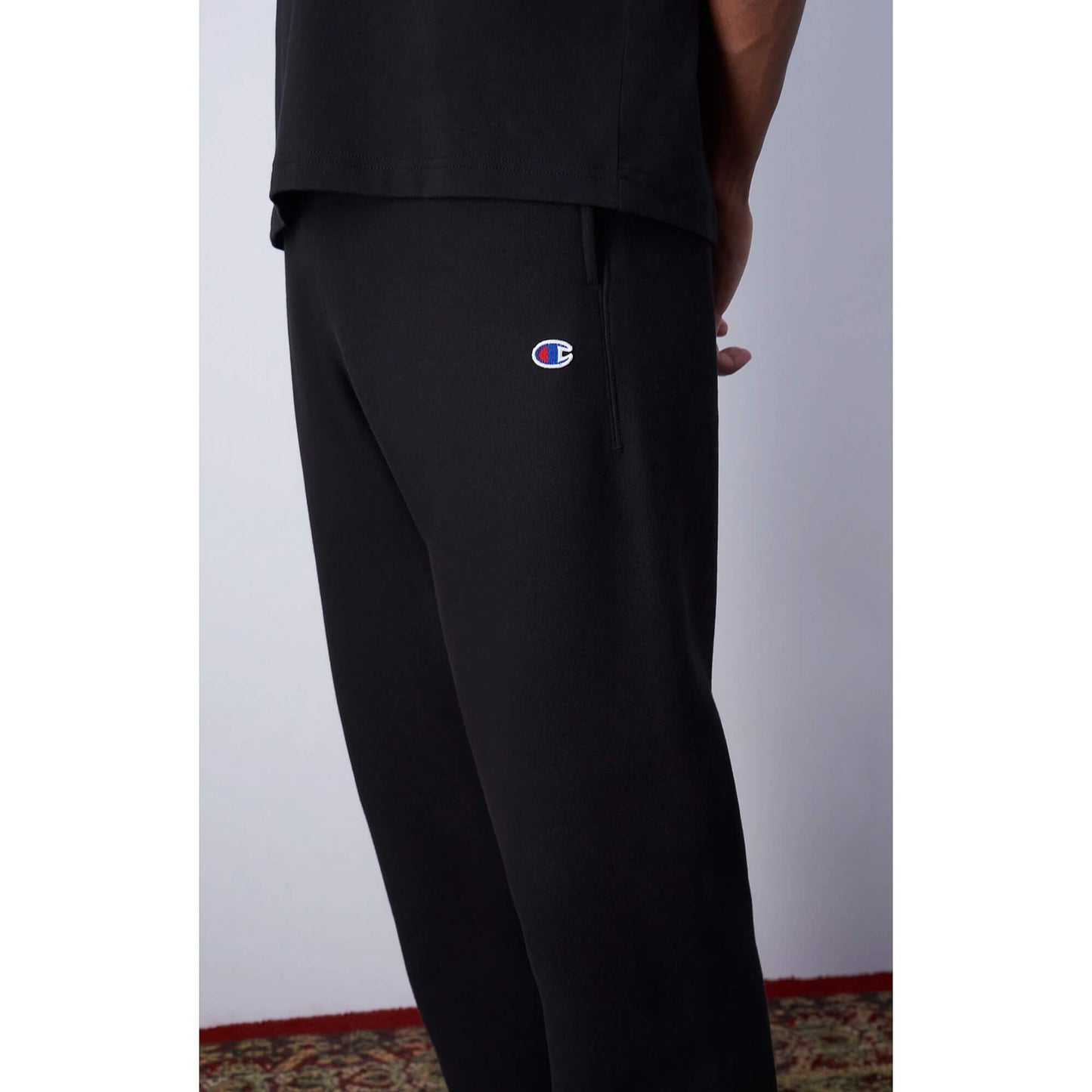 Tepláky Champion Premium RWSS 1952 Elastic Cuff Pants čierne