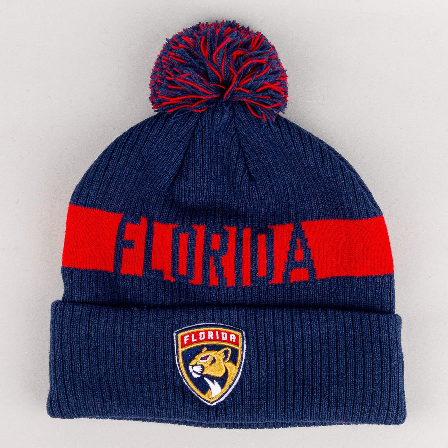 Zimná čiapka s brmbolcom Fanatics NHL Fundamental Beanie Cuff with Pom Florida Panthers tmavomodrá/červená