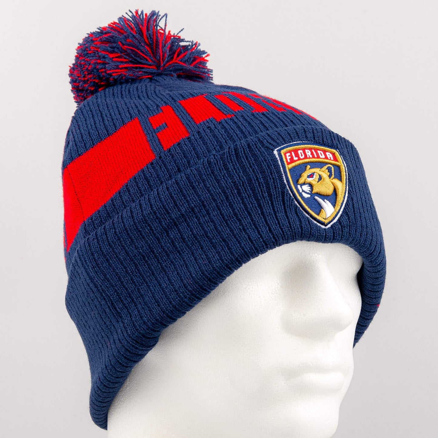 Zimná čiapka s brmbolcom Fanatics NHL Fundamental Beanie Cuff with Pom Florida Panthers tmavomodrá/červená