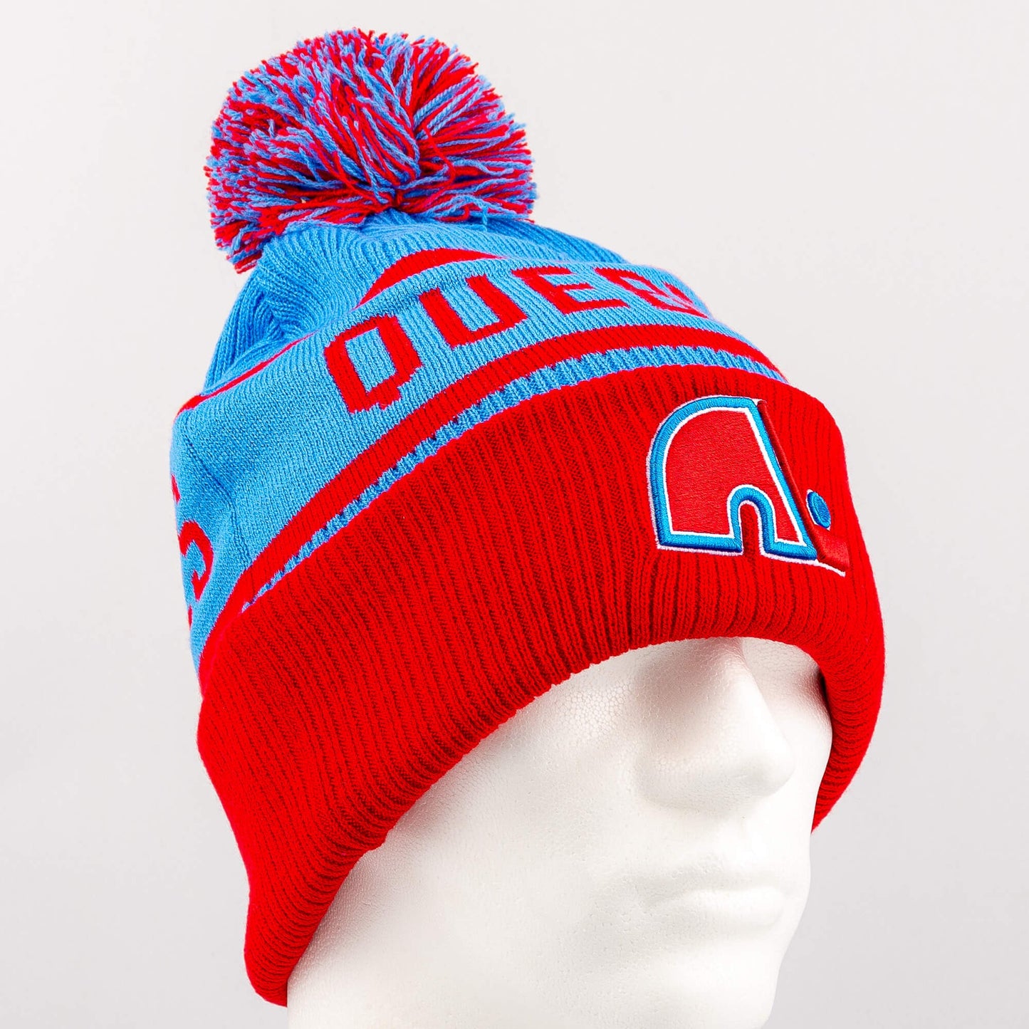Zimná čiapka s brmbolcom Fanatics NHL Heritage Beanie Cuff with Pom Quebec Nordiques modrá/červená