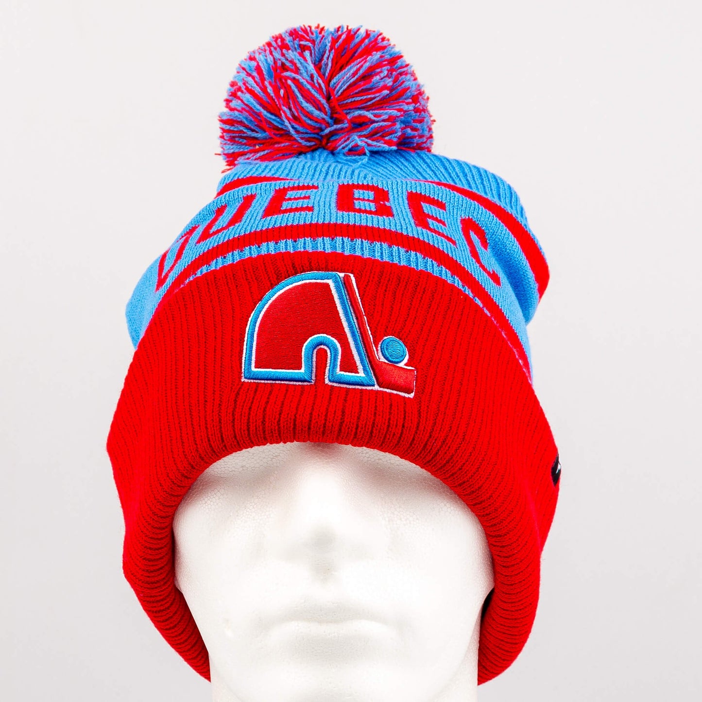 Zimná čiapka s brmbolcom Fanatics NHL Heritage Beanie Cuff with Pom Quebec Nordiques modrá/červená