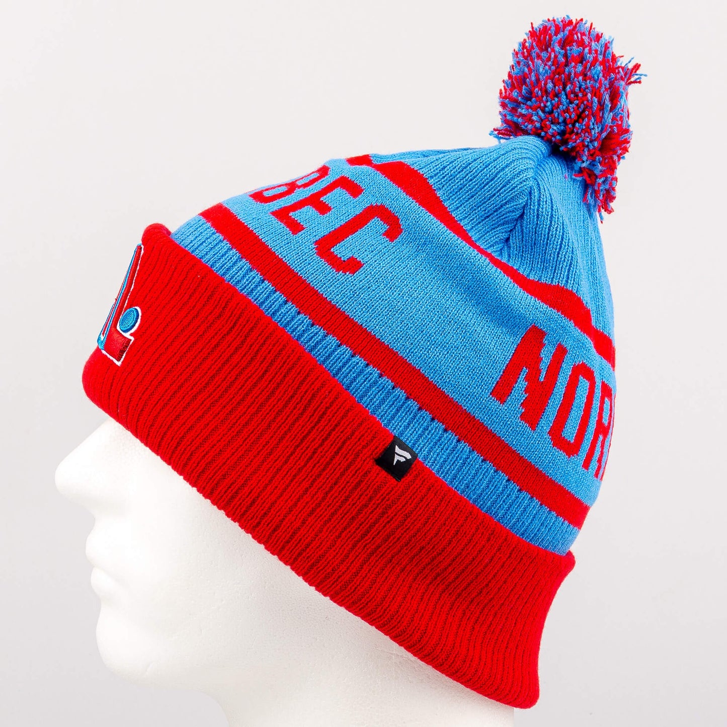 Zimná čiapka s brmbolcom Fanatics NHL Heritage Beanie Cuff with Pom Quebec Nordiques modrá/červená